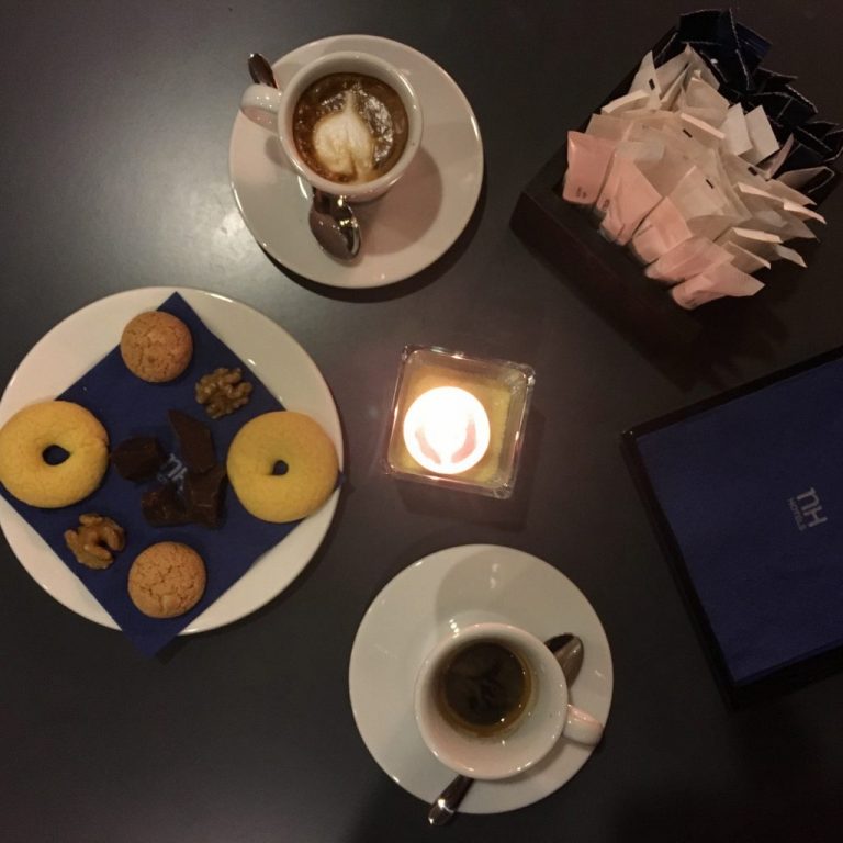 Coffee with biscuits and chocolate
